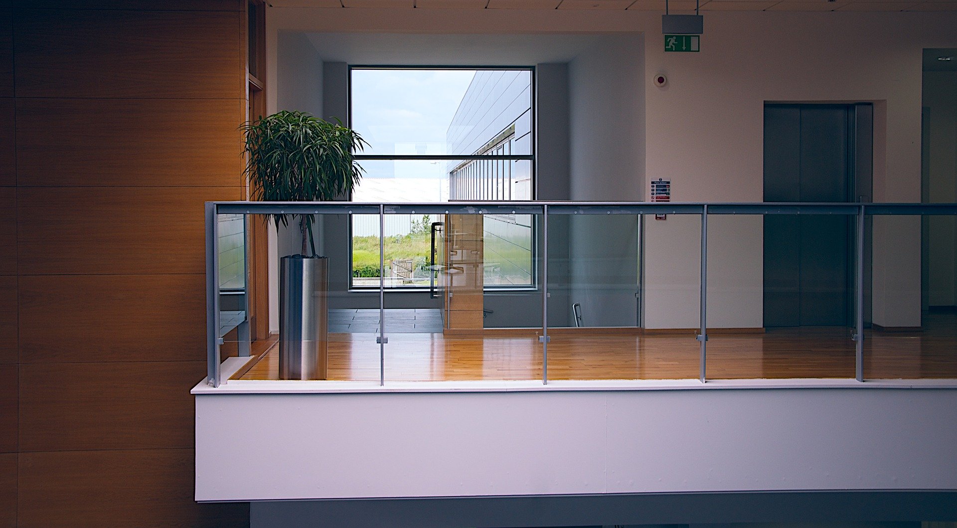 Staircase and elevator in office building.