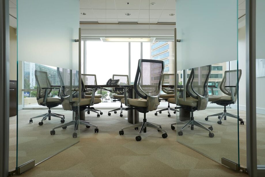 Conference room with empty chairs.