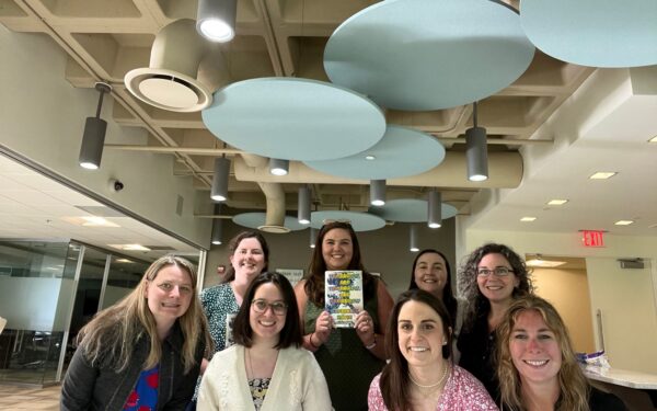 Ellin & Tucker Book Club poses with Tomorrow, and Tomorrow, and Tomorrow by Gabrielle Zevin.