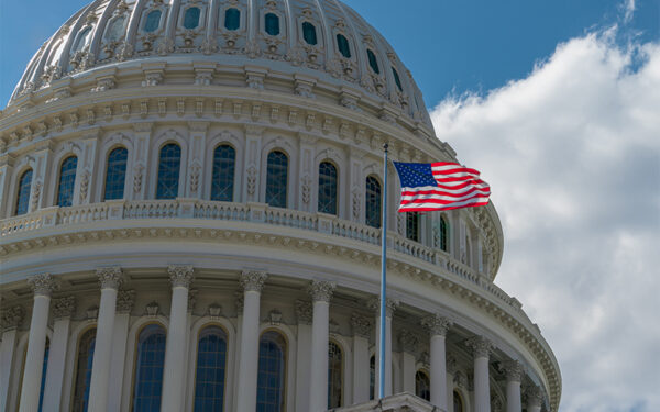 US Flag flying outside the Capitol State Building Washington DC