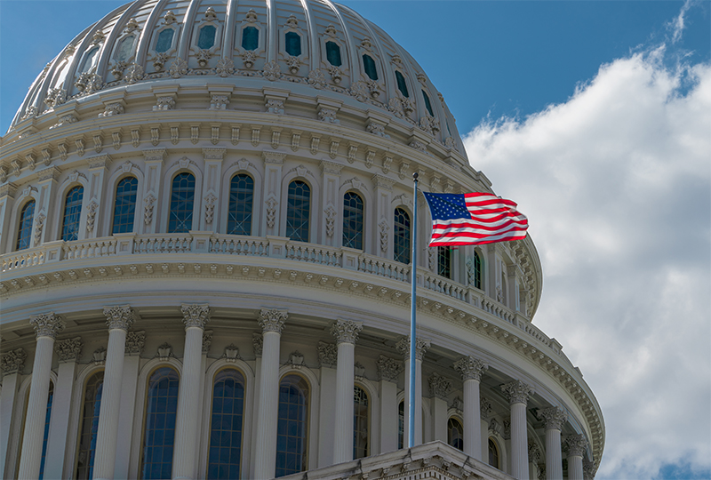US Flag flying outside the Capitol State Building Washington DC