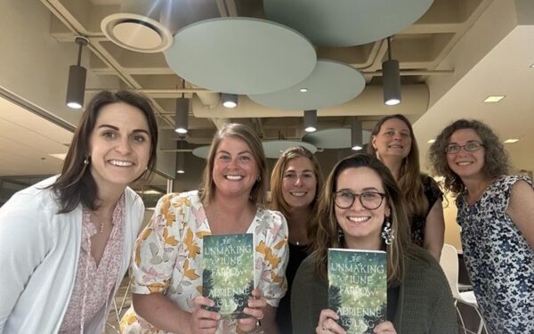 Ellin & Tucker book club poses with The Unmaking of June Farrow