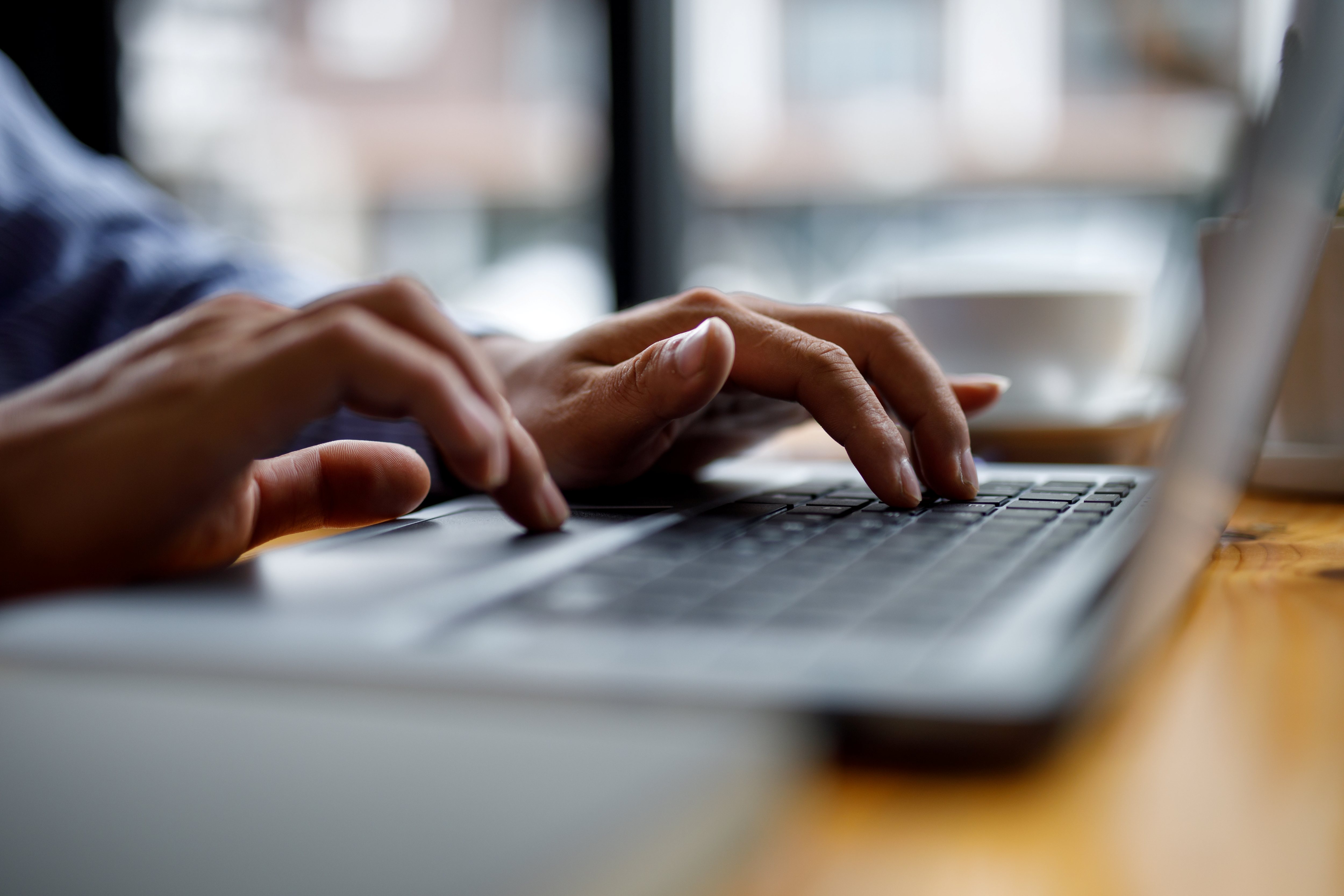 businessman using laptop on desk